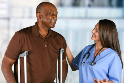 young caregiver assisting her patient in reading